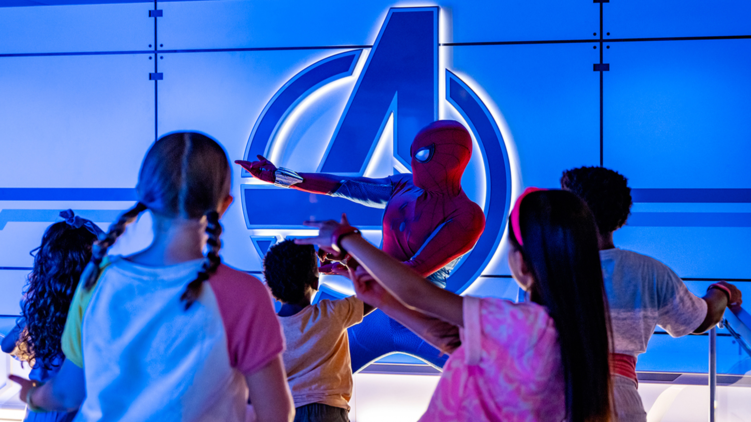 Kids train alongside Spider-Man at the Marvel Super Hero Academy.