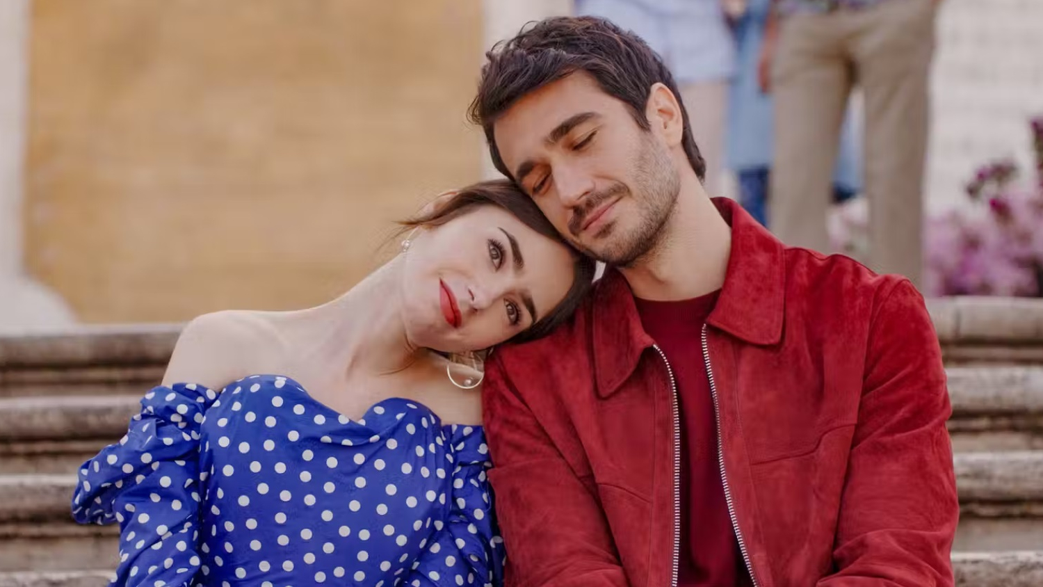 Emily enjoys a moment with Marcello on the Spanish Steps. (Photo: Netflix)