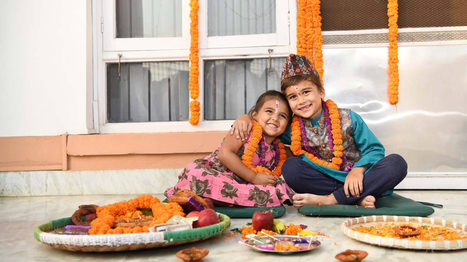 Sister applies 'Tika' on her brother's forehead as a way of expressing Gratefulness. 