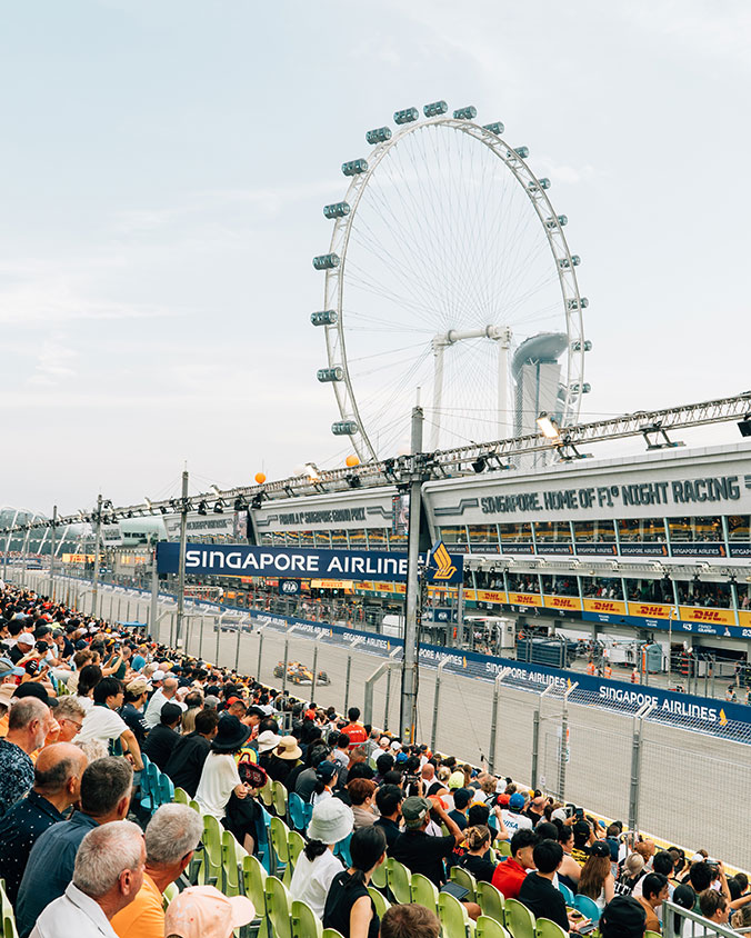 Spectators watching the Singapore Grand Prix practice session from the Pit Grandstand.