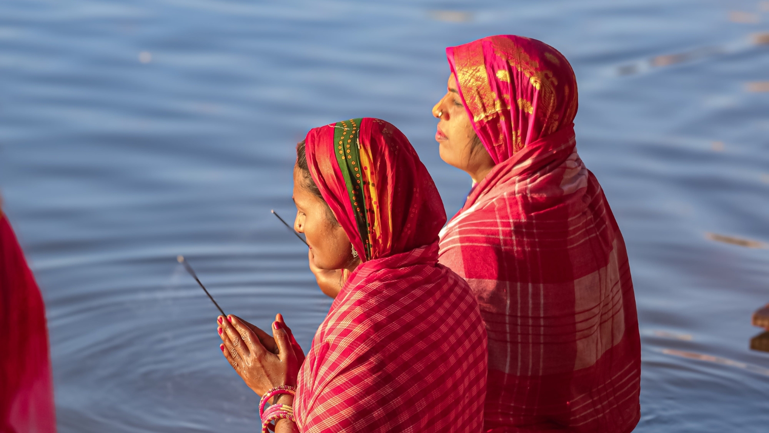 Pilgrims praying in the river during Maha Kumbh Mela 2025.