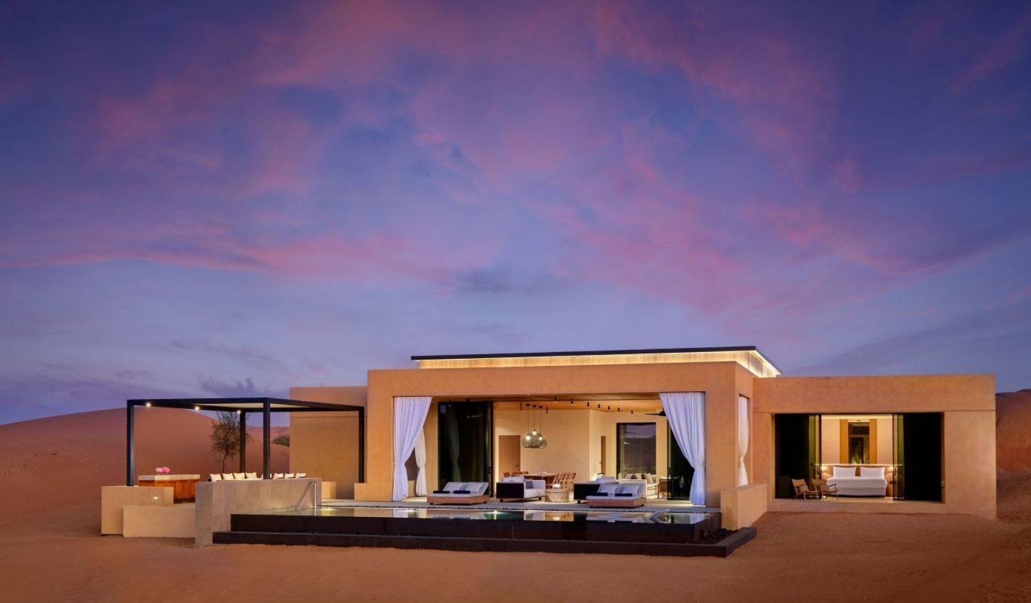 Al Wadi Desert blends luxe tented villas with daily wildlife encounters.