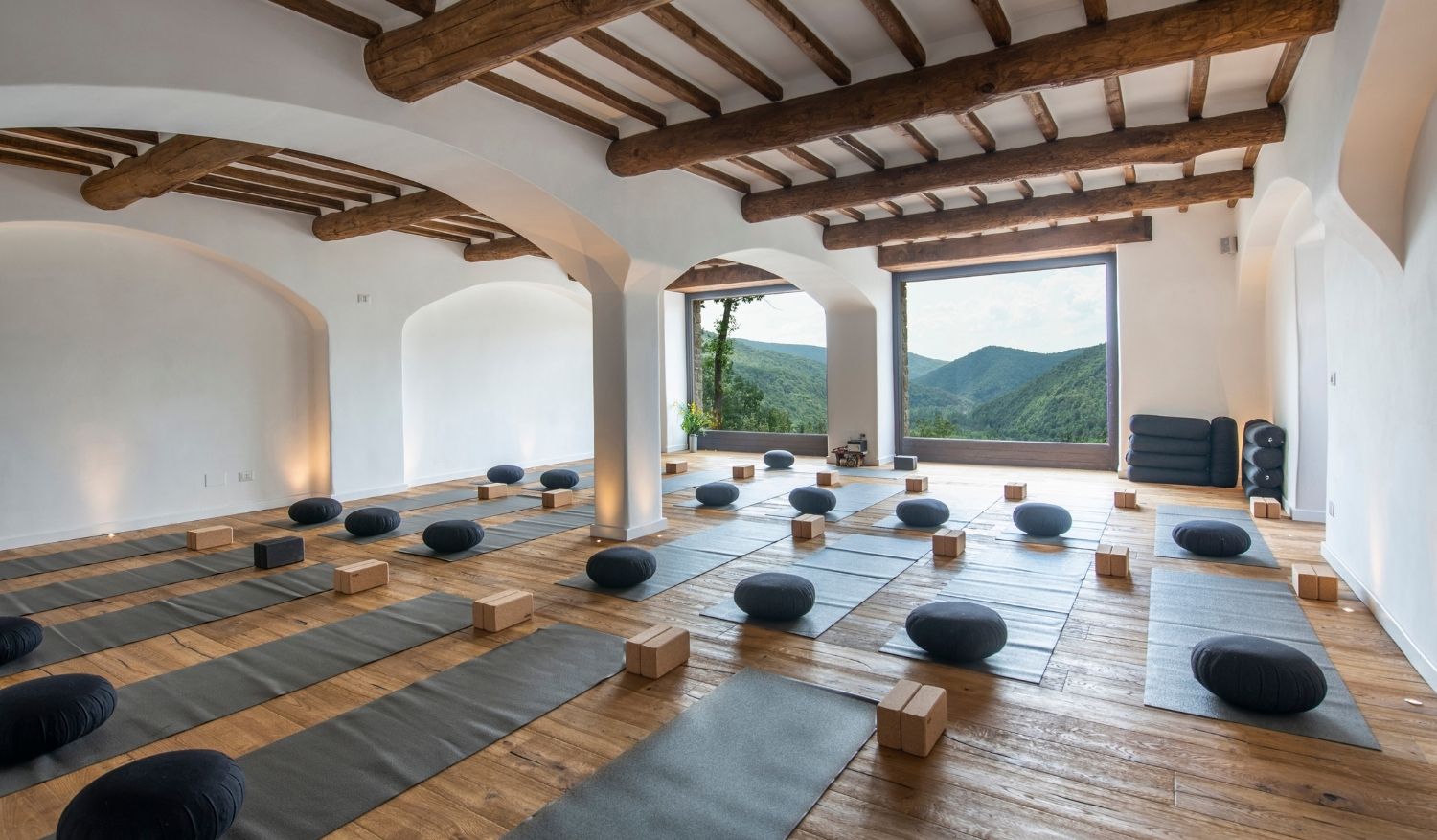 The Italian remote wellness retreat even has a special yoga room overlooking the greeneries.