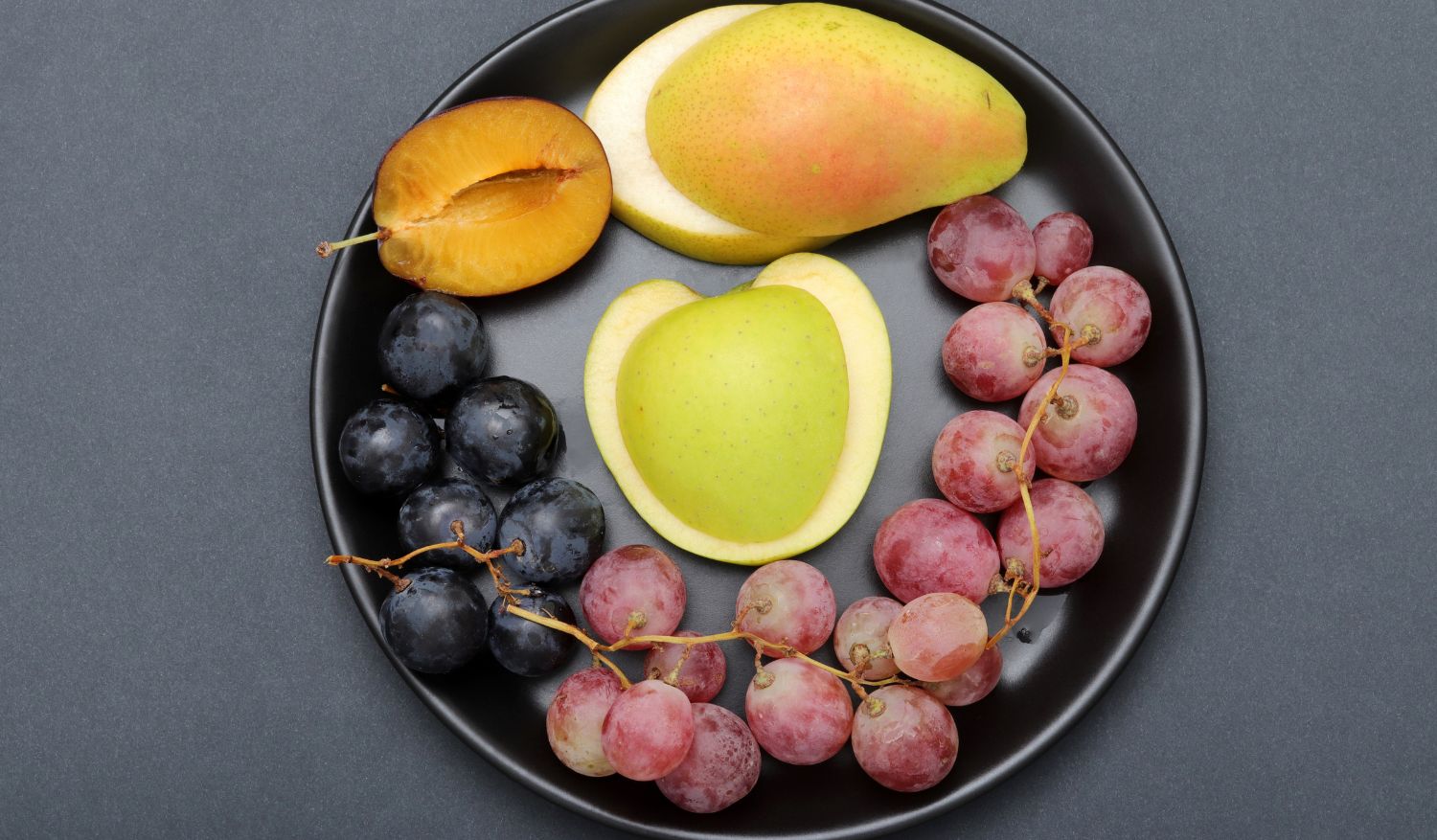 Peaches, melons, and grapes offered to the spirits.