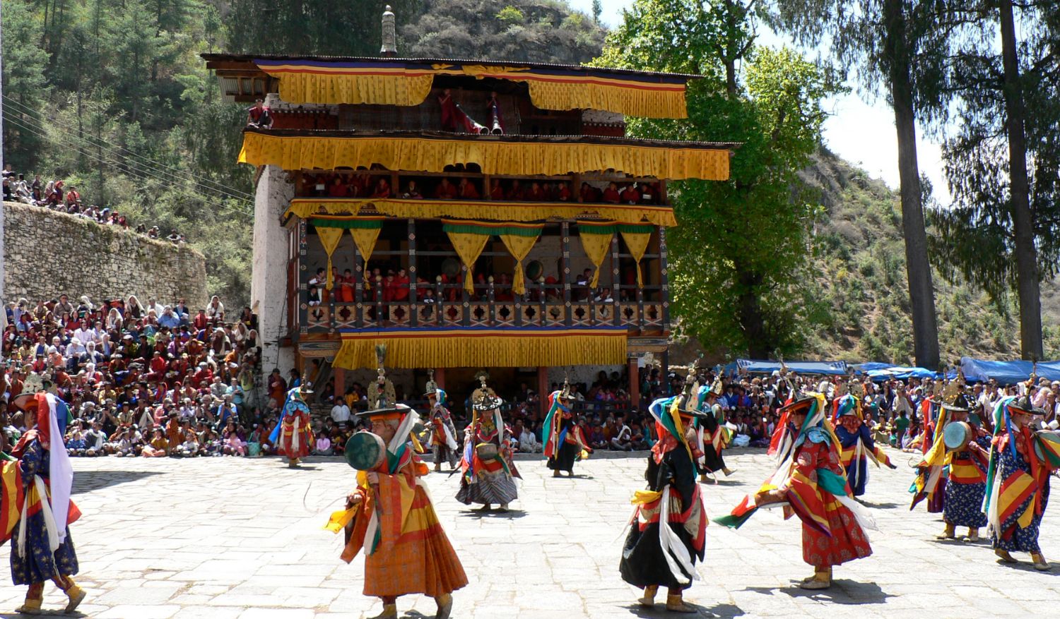 Festivals like Thimphu’s Tshechu remind us of the importance of rituals, stories, and shared meals. (Photo: Wiki Commons)