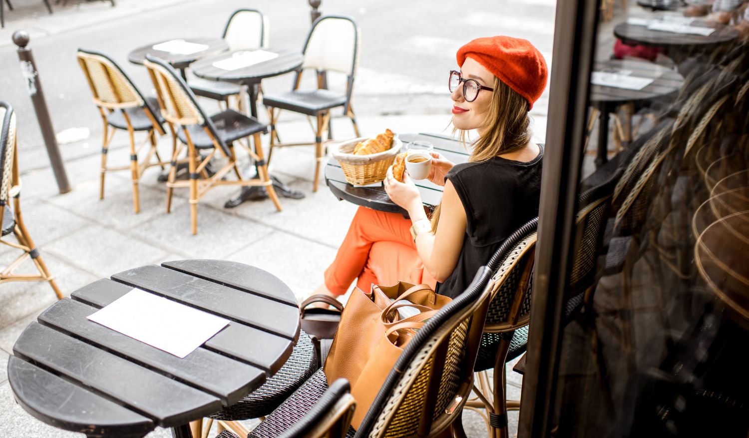 People watching as one enjoys a cup of coffee is a popular pastime in many European cafes. 